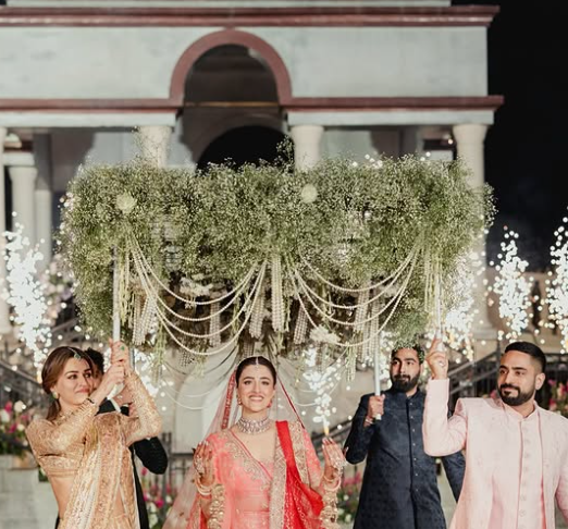 Kriti Sanon walks Nupur Sanon down the aisle